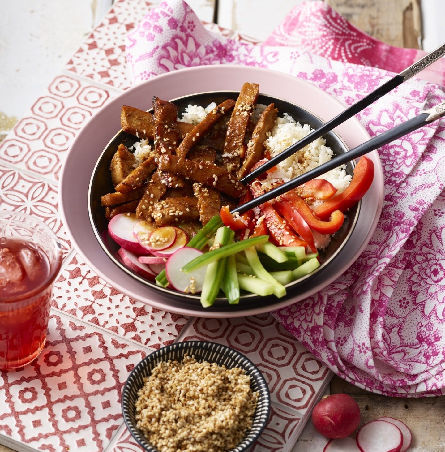 Korean pork bowl with chopsticks.