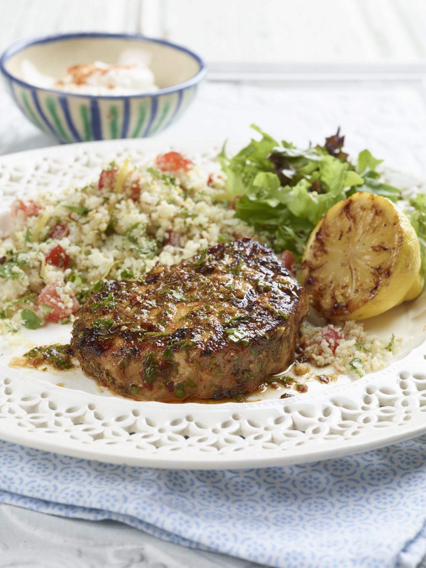 Chermoula pork medallion served on a white plate