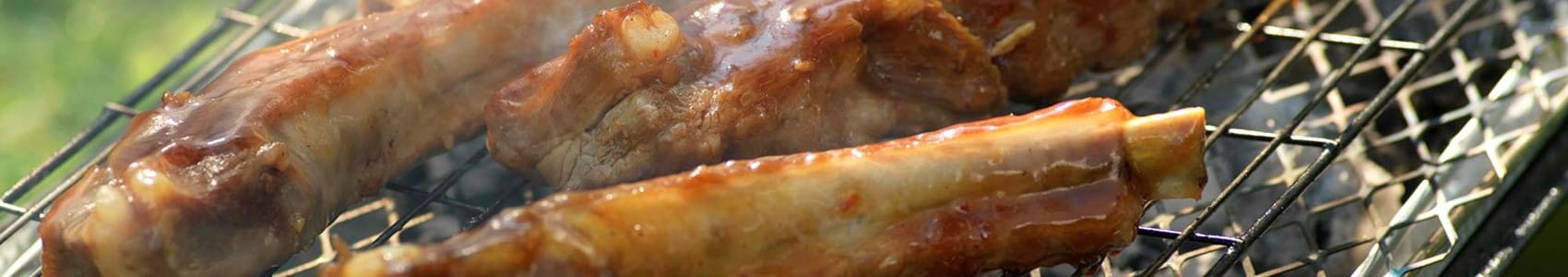 Up close shot of bbq ribs on the bbq