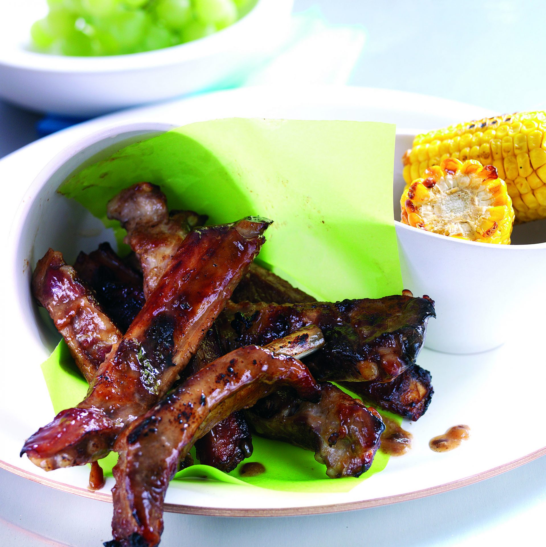 Sticky chinese ribs on a white plate