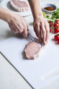 Cutting the pork loin steak