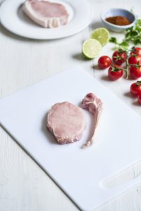 Pork loin steak with fat next to it removed