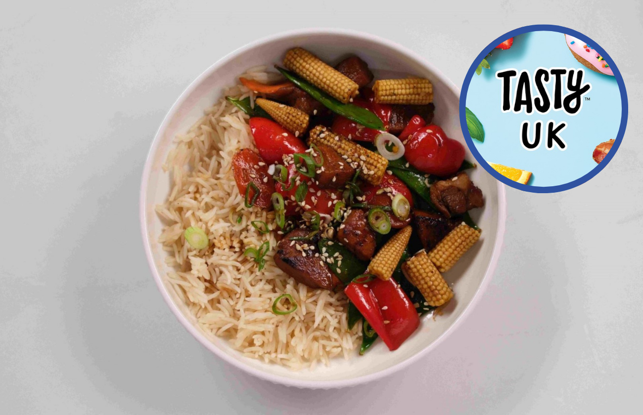 Honey and Garlic Pork Rice Bowl on a white backdrop.