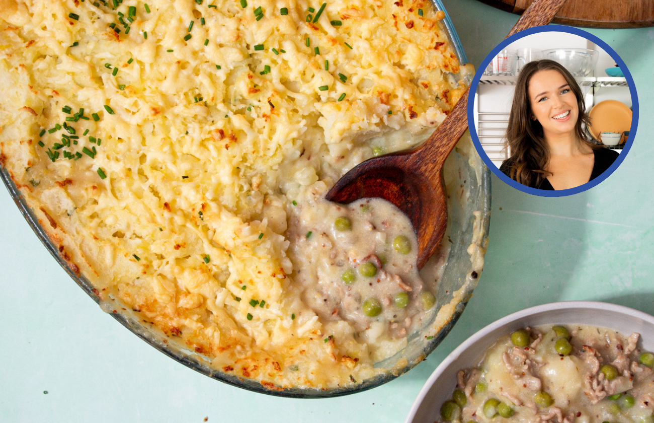 Pork cheese and potato pie in a large casserole dish with wooden serving spoon. Portion served in a bowl. with beat the budget