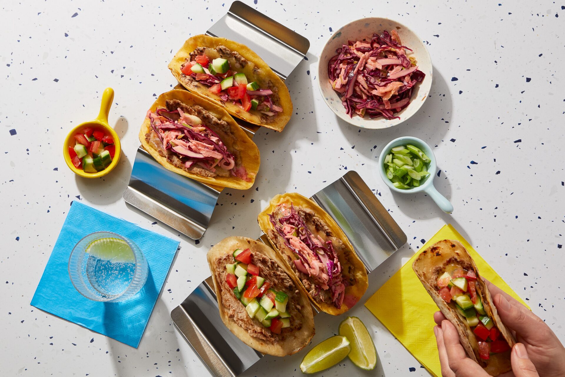 viral smashburger tacos made with pork mince serve on taco trays with serving suggestions