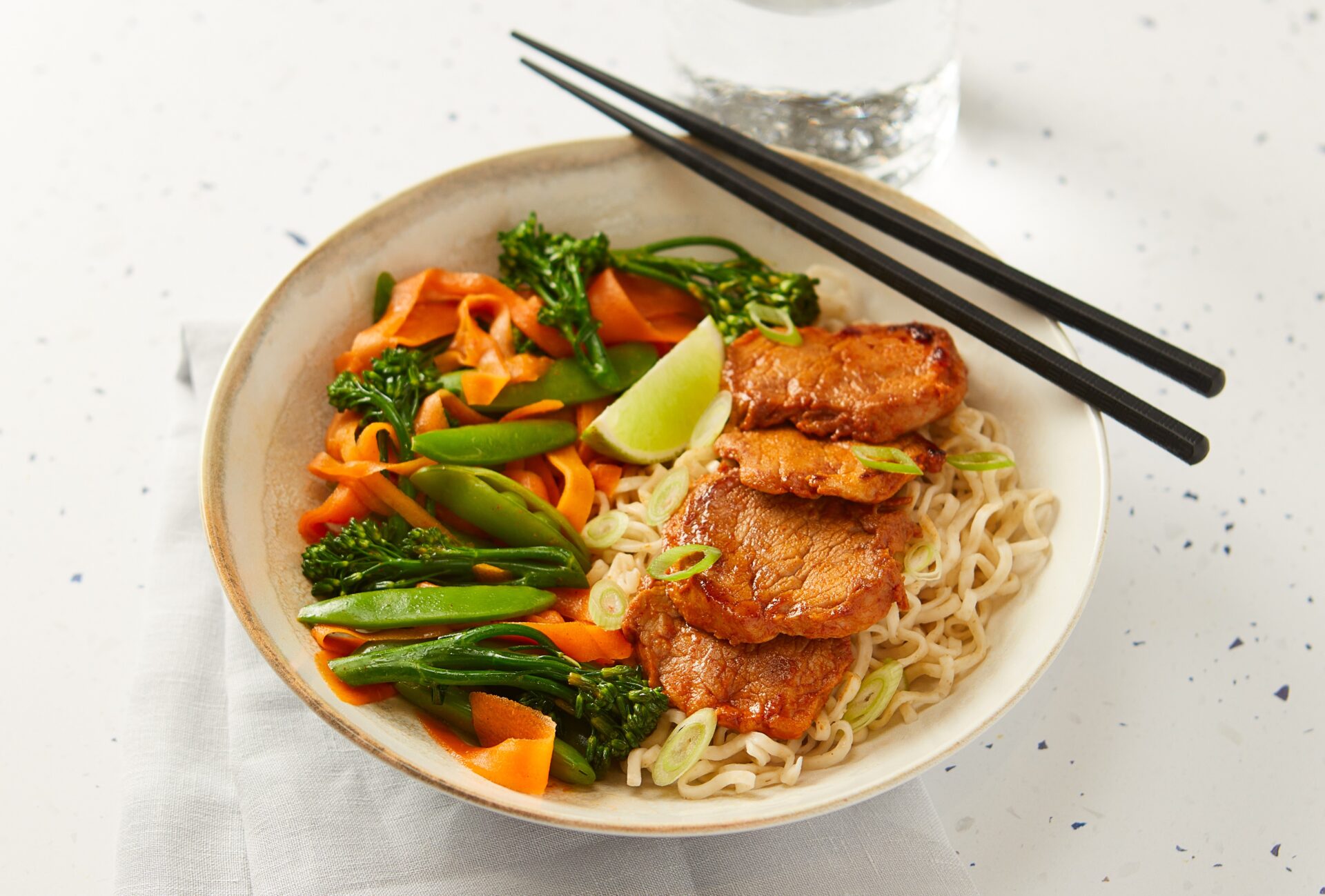 Bowl of Gochujang Pork with noodles and vegetables