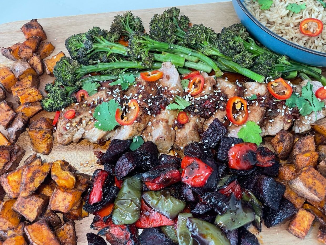 Inspired Pork Tenderloin Served with Rainbow Roasted Vegetables and Wholegrain Rice