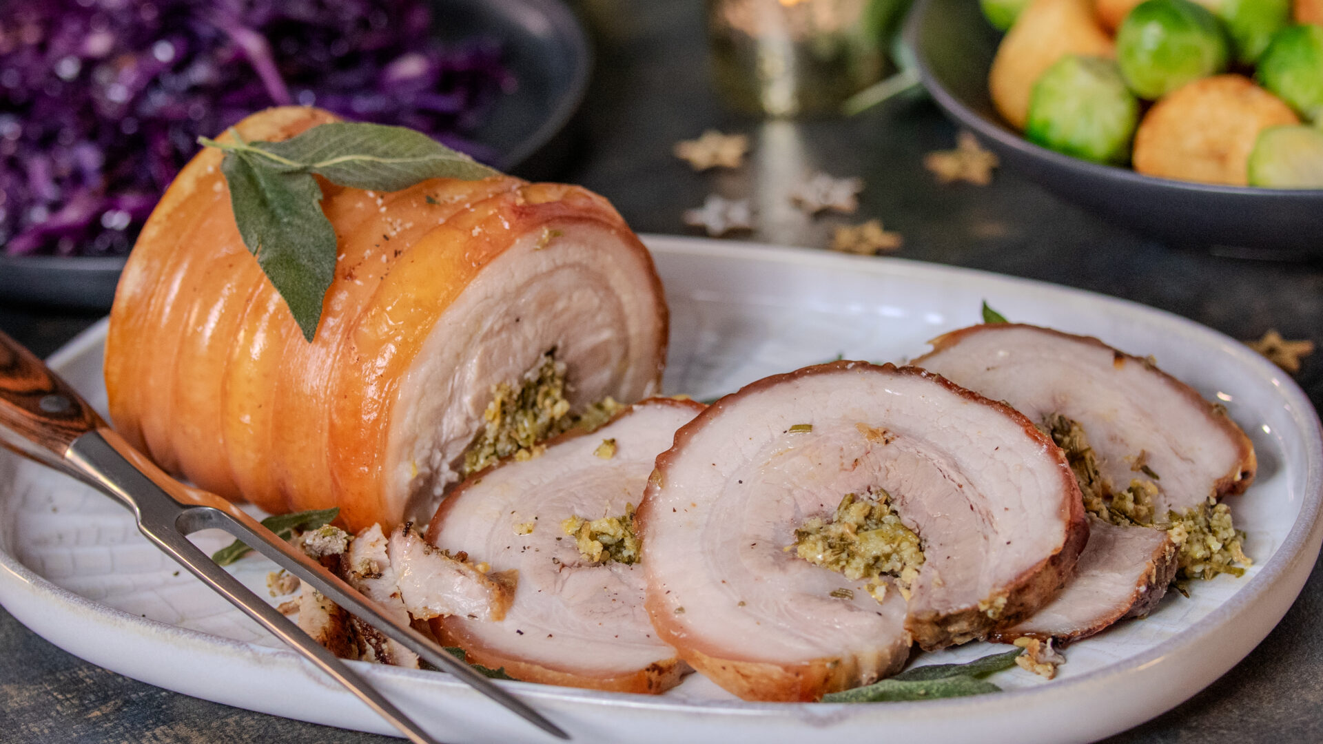 Some Pork Belly Porchetta on a white plate